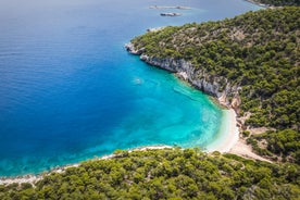 Photo of Heraion in Perachora with small beach, Loutraki, Greece.