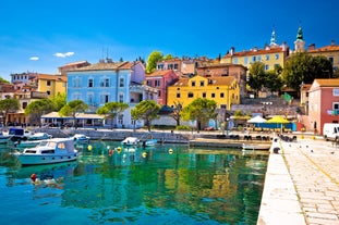 photo of aerial panoramic view of beautiful town of Lovran and sea walkway in Croatia.