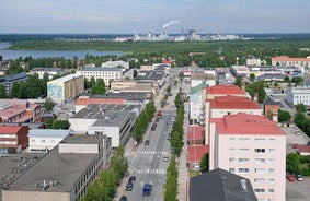 Rovaniemi Finland, panorama of the city with Kemijoki river in the back and Ounasvaara fell with the city heart at the left.