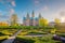 Photo of Rosenborg Castle Gardens in Copenhagen, Denmark with blue sky.