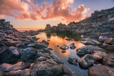 photo of Laghetto delle ondine. Ondine natural pool in Pantelleria in Sicily, Italy.