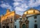 Photo of Baroque facades of the parish of San Andrés and the Church of Jesus, headquarters of the Salzillo Sculpture Museum, both in the city of Murcia.