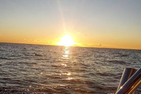 Sunset by boat in Marbella