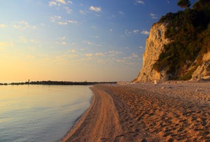 photo of majestic sunrise in Numana public beach. Picturesque summer seascape of Adriatic Sea. Colorful outdoor scene of Italy, Europe.