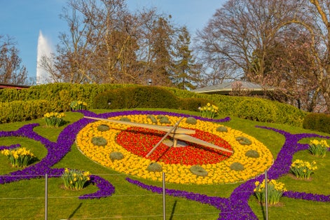 Photo of flower clock or L'horloge fleurie is a symbol of the city watchmakers, located in Jardin Anglais park in Geneva city in Switzerland.