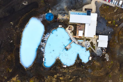 photo of Blue lagoon in Iceland. Most famous and popular place in Iceland. Wellness and spa. Landscape from air. Vacation image. Blue and hot water in geothermal lake. Icelandic nature. View from drone.