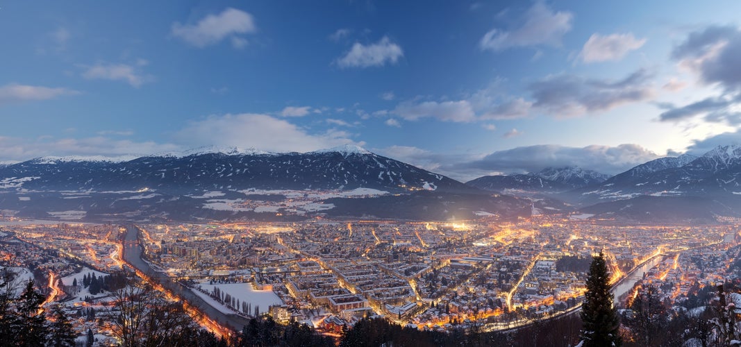 photo of panorama of Innsbruck at night photographed from Hungerburg, Innsbruck, Tyrol, Austria.