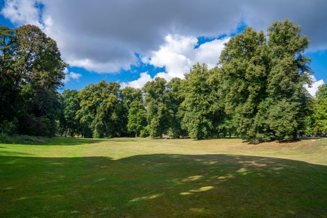 Hagaparken Park in Solna Northern Stockholm With open meadow and green areas, big trees and forest in background.