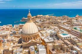 Aerial view of Lady of Mount Carmel church, St.Paul's Cathedral in Valletta embankment city center, Malta.