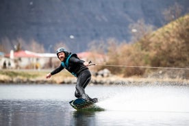 Sightseeing and wakeboarding, waterskiing experience in Dynjandi