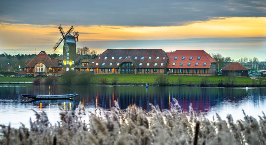 Photo of A panoramic picture of the windmill at Caldecotte Lake in Milton Keynes at sunset.