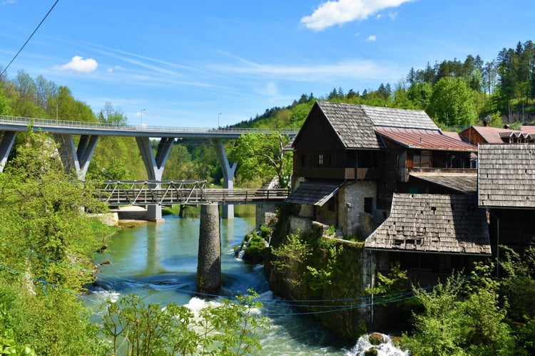 photo of view of Old buildings in Slunj town with bridges over Korana river in Karlovac county, Croatia