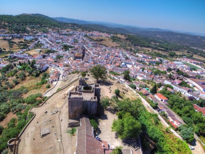photo of aerial view of the beautiful Cortegana Castle in Huelva, Spain.