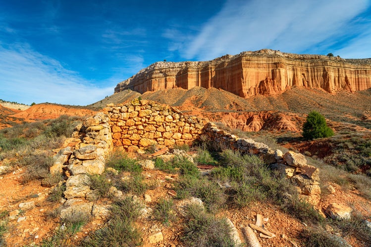 photo of view of Desert landscape and colourful canyons at Canon Rojo de Teruel in the Aragon region of Spain