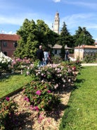 Photo of beautiful view of canal with statues on square Prato della Valle and Basilica Santa Giustina in Padova (Padua), Veneto, Italy.