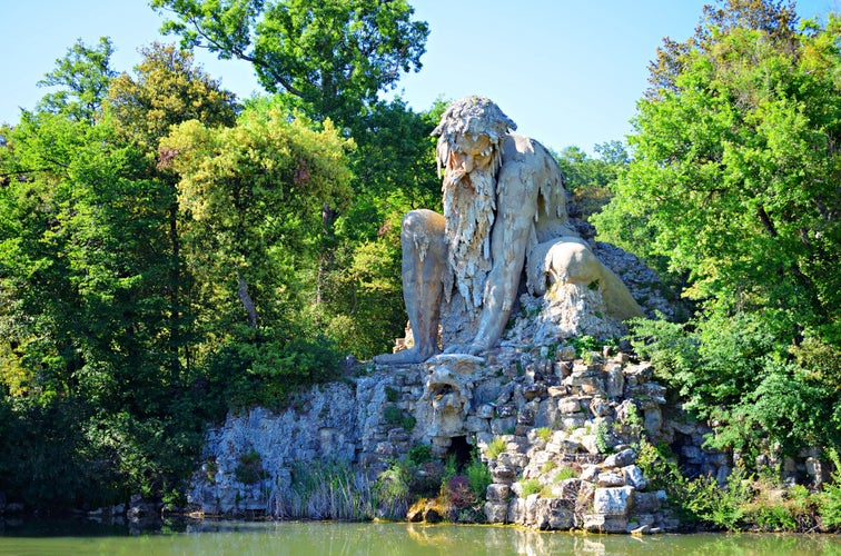 Photo of The Colossus of the Apennines, majestic stone sculpture by Giambologna located in the park of Villa Demidoff in Florence, Italy.