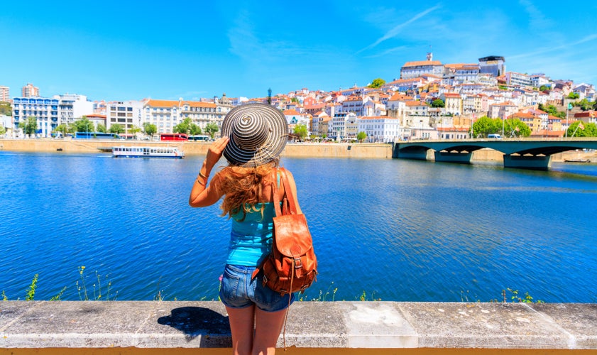 Traveler woman visiting Coimbra city in Portugal