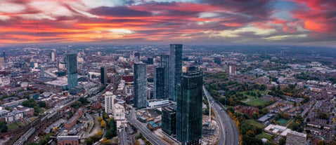 Aerial drone view of Manchester city in UK on a beautiful sunny day.