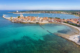 Photo of aerial view to the town of Porec in Istria, Croatia on Adriatic coast.