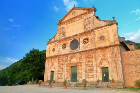 Old facade with Romanesque design of the church of San Pietro in Spoleto, region of Umbria, Italy