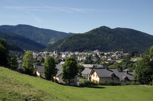 Photo of morning cityscape view with mountains, river and bridge in Grenoble city on the south-east of France.