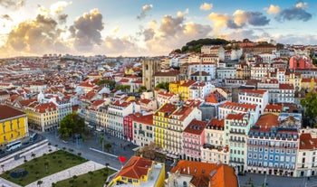 Photo of Lisbon City Skyline with Sao Jorge Castle and the Tagus River, Portugal.