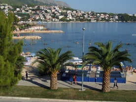 Photo of aerial view of Stobrec popular touristic destination on Adriatic sea, suburb of city of Split, Croatia.