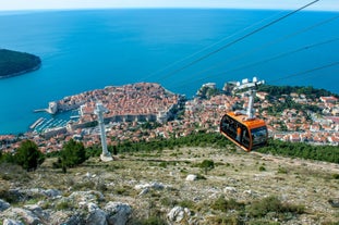 Photo of panoramic aerial view of the old town of Dubrovnik, Croatia seen from Bosanka viewpoint on the shores of the Adriatic Sea in the Mediterranean Sea.