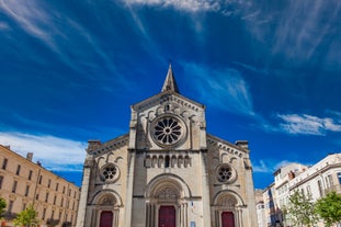 Photo of Old bridge and Saint Nazaire cathedral on the Orb river in Beziers, France.