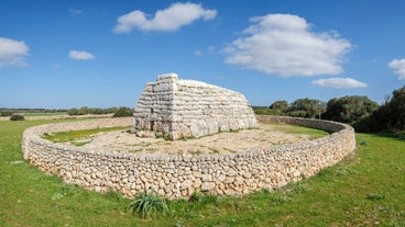 Photo of Cala Macarelleta in Ciutadella Menorca at turquoise Balearic Islands, Spain.