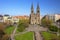 Photo of aerial view of Peace Square (Namesti Miru) Vinohrady Quarter, Vinohrady Theatre and the Cathedral of St. Ludmila at the district of Vinohrady, Prague, Czech Republic.