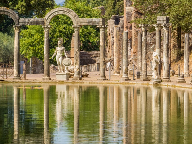 The ancient pool called Canopus, surrounded by greek sculptures in Hadrian's Villa, Tivoli, Italy