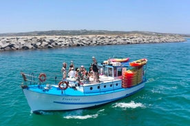 Erkunden Sie Höhlen und Strände von Alvor - Boot- und Kajaktour.