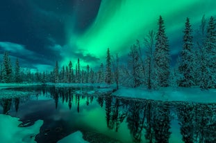 photo of endless landscape in finish Lapland Kolari close to the ski resort of Ylläs during dusk in Finland.