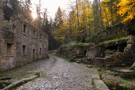 Photo of beautiful abandoned Dolsky Mill in the valley of the Kamenice river, Czech Republic.