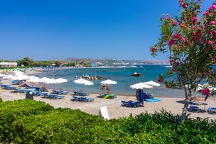 Photo of panoramic aerial view of Lindos bay, village and Acropolis, Rhodes, Greece.