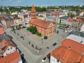 Photo of aerial view of Torun old town with Vistula river, Poland.