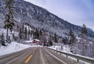 photo of panorama of ski resort with ski slopes and approaching snowstorm in Geilo, Norway.