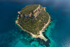 Photo of aerial view of Pittulongu, White Beach in Olbia, blue water, amazing Vegetation and sandy beaches with Tavolara island view, Italy.