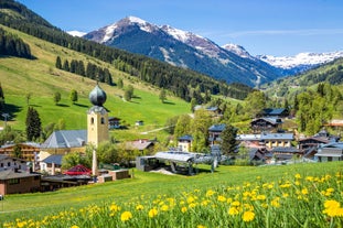 Photo of aerial view over Saalbach village in summer, Austria.