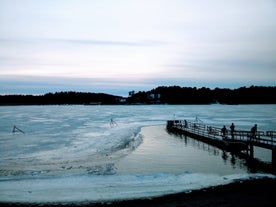 Early autumn morning panorama of the Port of Turku, Finland, with Turku Castle at background.