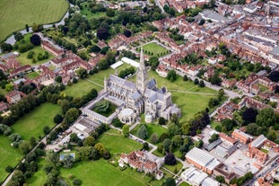 Photo of aerial view of Salisbury cathedral in the spring morning, England.