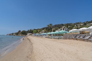 photo of harbor and town of Golfe-Juan Vallauris, commune of the Alpes-Maritimes department, which belongs in turn to the Provence-Alpes-Cote of Azur region of France.