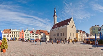 Scenic summer view of the Old Town and sea port harbor in Tallinn, Estonia.