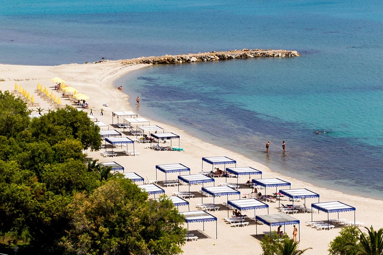 Photo of Kallithea sunny beach and summer resort at Kassandra of Halkidiki peninsula in Greece.