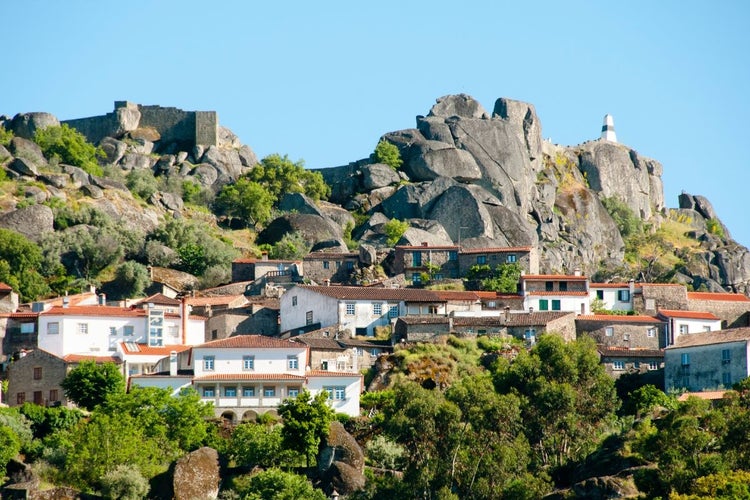 See a Village Built Around a Rock .jpg