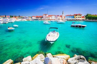 Photo of aerial view of town of Rovinj historic peninsula , famous tourist destination in Istria region of Croatia.