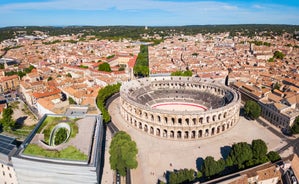 Photo of Nimes Arena aerial panoramic view. Nimes is a city in the Occitanie region of southern France.
