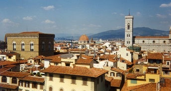 Aerial panoramic cityscape of Rome, Italy, Europe. Roma is the capital of Italy. Cityscape of Rome in summer. Rome roofs view with ancient architecture in Italy. 