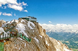 Photo of Suspension Bridge of Dachstein Skywalk viewpoint in Austria, with people, in Ramsau am Dachstein.